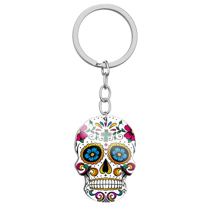 Llavero de acero inoxidable con estampado a color de calavera del Día de los Muertos