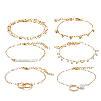 Tocona - Pulseras bohemias con borlas doradas para mujer, joyería bohemia, cuentas geométricas de hojas, conjunto de pulseras con dijes en capas 