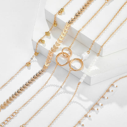 Tocona - Pulseras bohemias con borlas doradas para mujer, joyería bohemia, cuentas geométricas de hojas, conjunto de pulseras con dijes en capas 