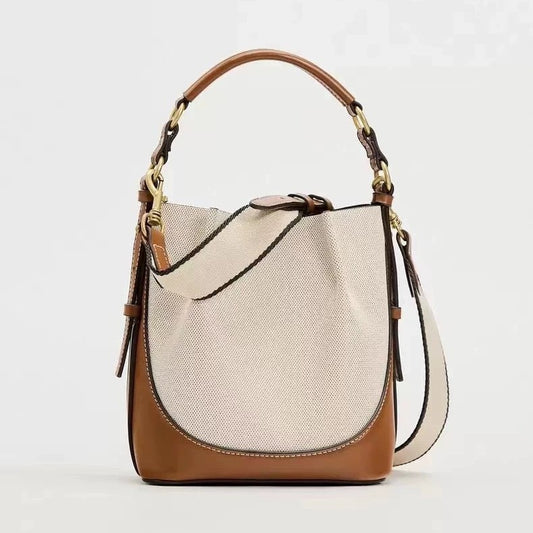 Bolso tipo cubo de lona con cordón en contraste