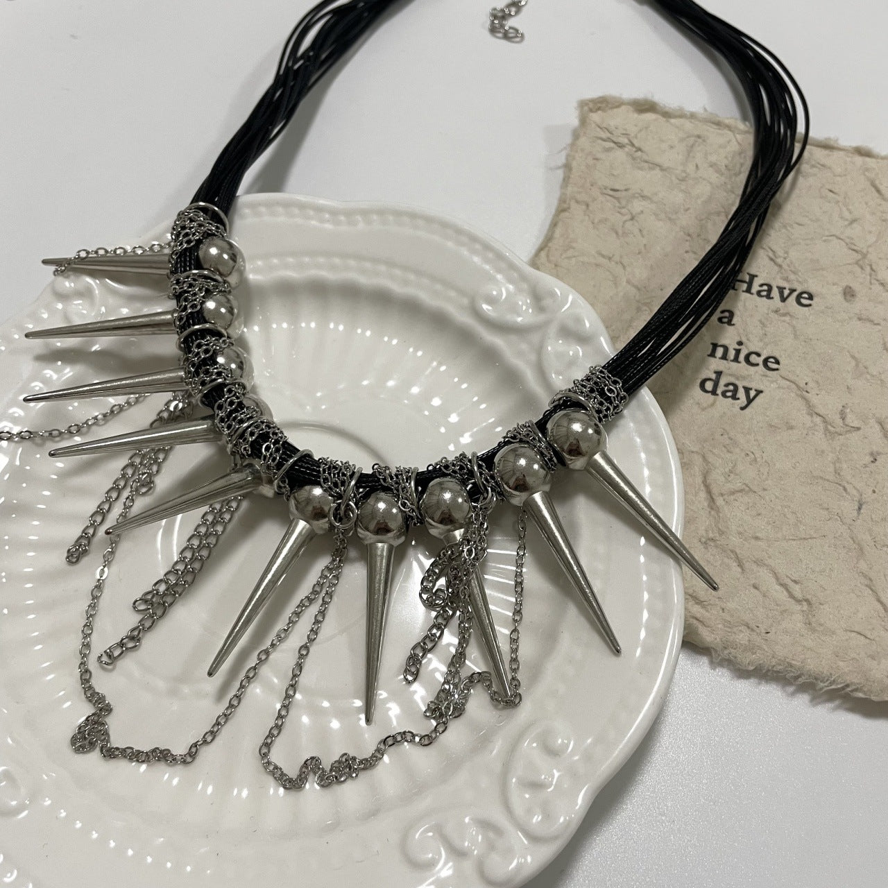 Rivet Round Beads Winding Tassel Necklace