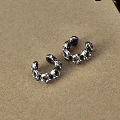 Pendientes de acero inoxidable estilo hip hop con diseño retro único y calavera hueca para hombre y mujer.