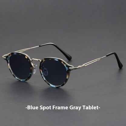 Gafas de sol con montura circular de metal y protección UV para hombres y mujeres.