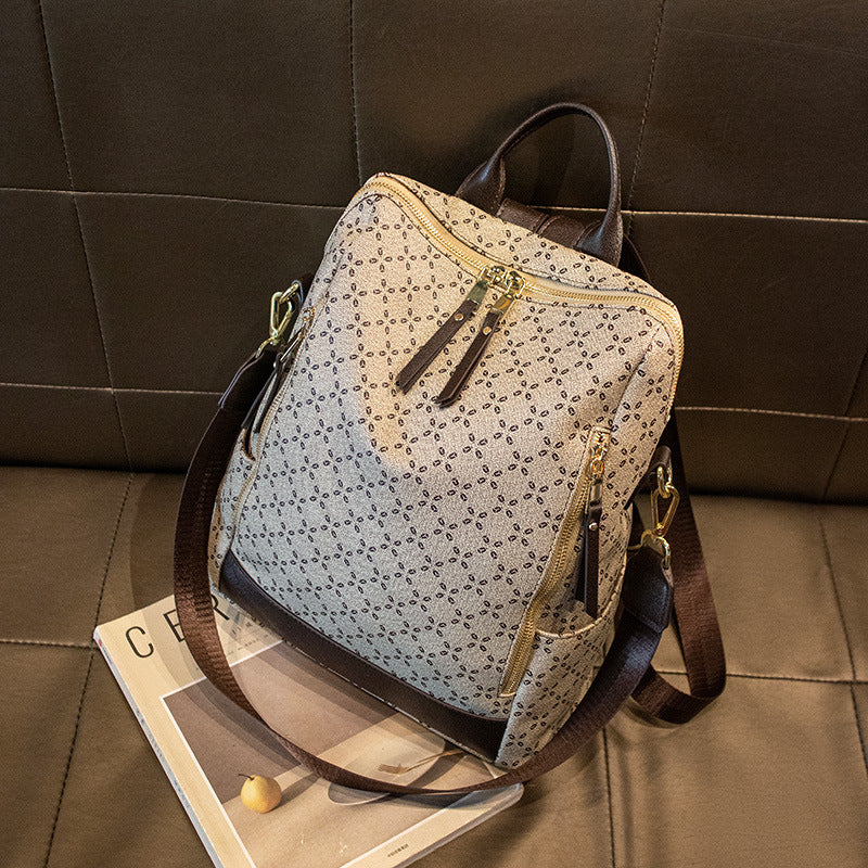 Mochila de viaje antirrobo retro estampada
