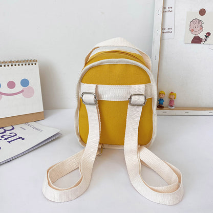 Niedlicher Mini-Kindergartenrucksack aus Segeltuch mit Bärenpuppe