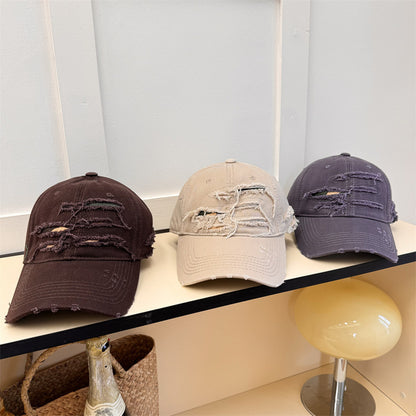 Sonnenhut machen alte zerrissene Softtop-Baseballkappe