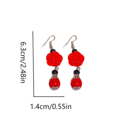 Pendientes de mariposa con incrustaciones de diamantes de imitación y plata de moda