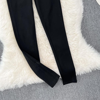 Pantalones negros de tubo versátiles para mujer