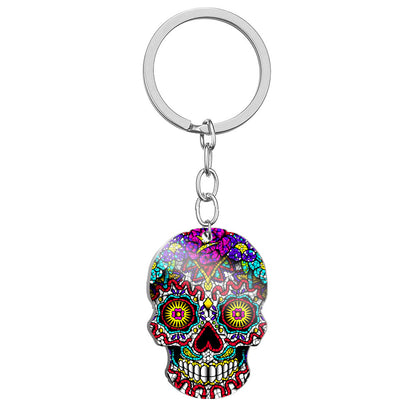 Llavero de acero inoxidable con estampado a color de calavera del Día de los Muertos