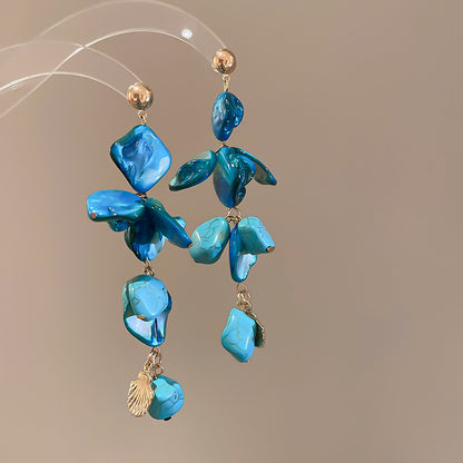 Pendientes redondos con borlas de concha y diseño de flores, ligeros, de lujo y de gran sentido.