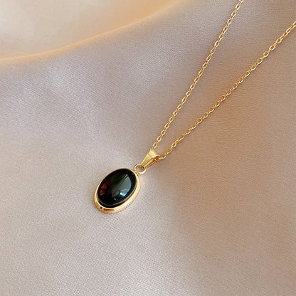 Collar de acero de titanio con colgante de ojo de gato ovalado Diseño de interés especial