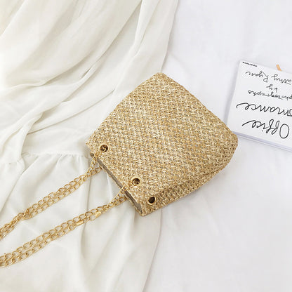 Bolso tipo cubo con cadena de cerezas