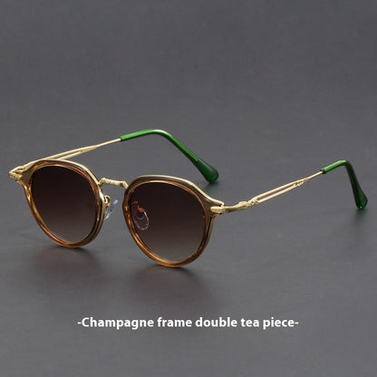 Gafas de sol con montura circular de metal y protección UV para hombres y mujeres.