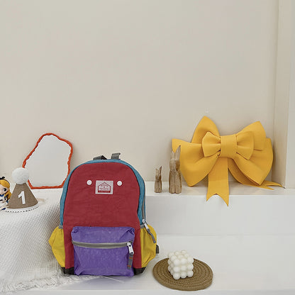Mochila de lona ligera y sencilla para niños y niñas con protección para la columna vertebral.