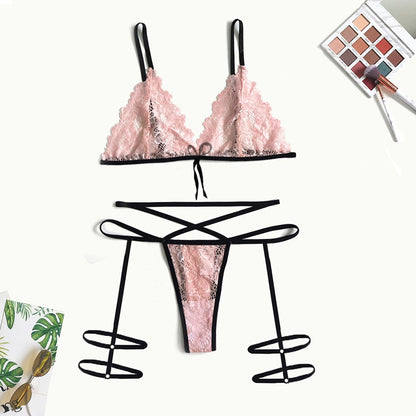 Conjunto de lencería sexy con encaje y tirantes para las piernas.