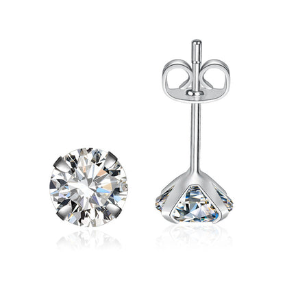 Pendientes de cuatro garras con circonita y diamante único de moissanita