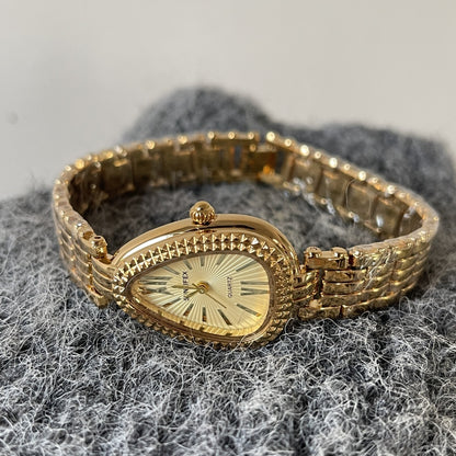 Reloj de mujer exquisito con correa de acero dorado de alta calidad