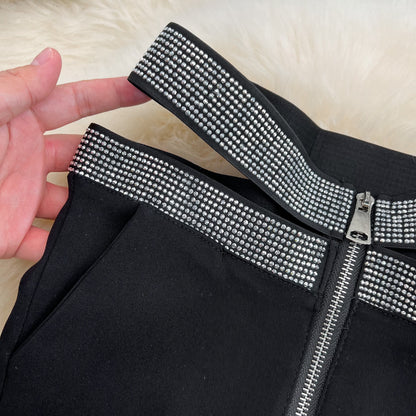 Pantalones negros de tubo versátiles para mujer