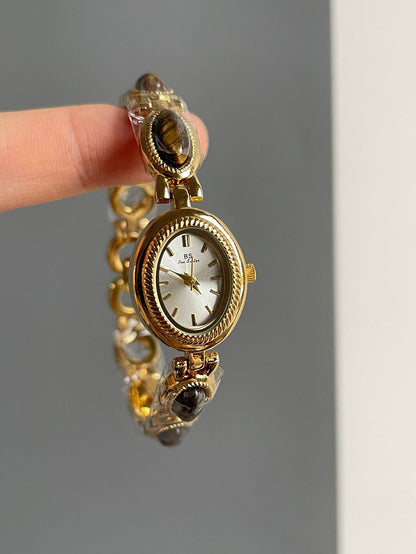 Reloj de pulsera de cuarzo con diamantes ovalados y jade pequeño para mujer