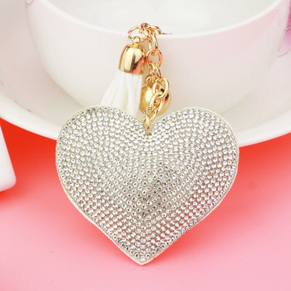 Llavero de cuero con forma de corazón de melocotón y diamantes de imitación, colgante para bolso con borlas de amor