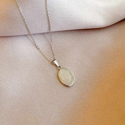 Collar de acero de titanio con colgante de ojo de gato ovalado Diseño de interés especial