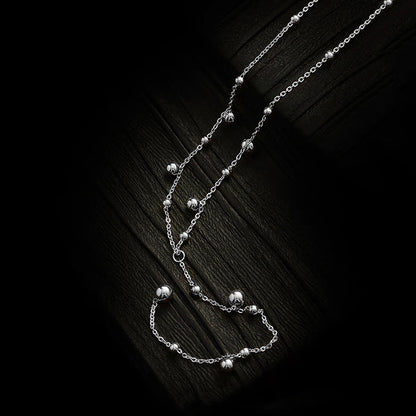 Collar largo con borlas y gorro de plata de ley S925