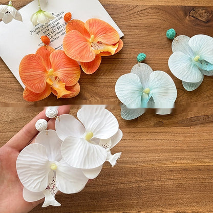 Pendientes elegantes con diseño de flores y personalidad para mujer