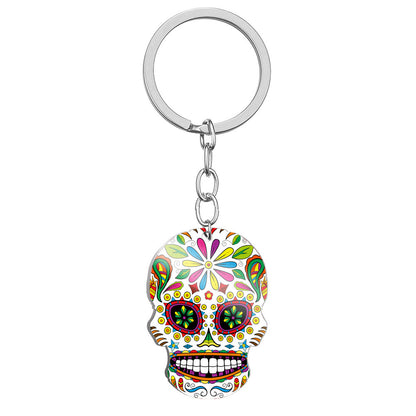 Llavero de acero inoxidable con estampado a color de calavera del Día de los Muertos