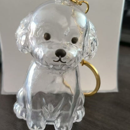 Lindo llavero colgante con forma de perro para guardar pelo