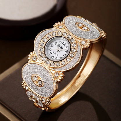 Reloj de cuarzo para mujer con diseño de flor y hoja de diamante ovalado