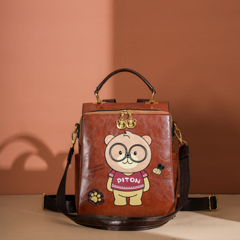 Mochila bandolera portátil con diseño de oso de dibujos animados