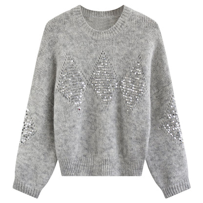 Lose Pullover mit schwerer Stickerei und Pailletten im Leerlaufstil. Lose Oberbekleidung. Strickwaren