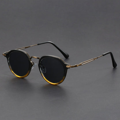 Gafas de sol con montura circular de metal y protección UV para hombres y mujeres.