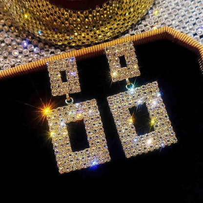 Pendientes de diamantes de imitación con borlas de flores y mariposas