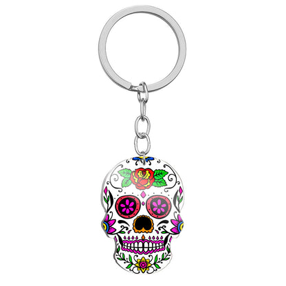 Llavero de acero inoxidable con estampado a color de calavera del Día de los Muertos