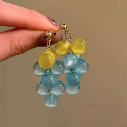 Pendientes redondos con borlas de concha y diseño de flores, ligeros, de lujo y de gran sentido.