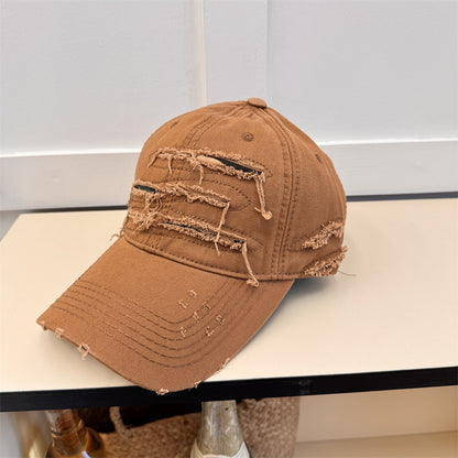 Sonnenhut machen alte zerrissene Softtop-Baseballkappe