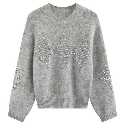 Lose Pullover mit schwerer Stickerei und Pailletten im Leerlaufstil. Lose Oberbekleidung. Strickwaren